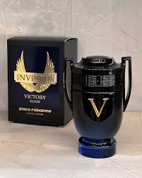 🏆 INVICTUS VICTORY ELIXIR 100 ML + Perfumero Recargable 🏆ID:49804-0